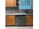 Stainless steel dishwasher and counter in the kitchen at 225 N Palmetto Ave, Fort Meade, FL 33841