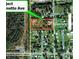 Aerial view of land plot with surrounding neighborhood at 225 N Palmetto Ave, Fort Meade, FL 33841