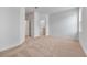 Bright bedroom with plush carpet and ensuite bathroom, perfect for relaxation and comfort at 247 Big Sioux Dr, Poinciana, FL 34759