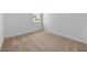 Comfortable bedroom with soft carpet and a window providing natural light at 247 Big Sioux Dr, Poinciana, FL 34759