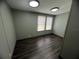 This bedroom features hard surface floors and neutral paint at 2777 Cr 673, Bushnell, FL 33513