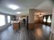 Open concept living space with island, kitchen, and living room at 2777 Cr 673, Bushnell, FL 33513