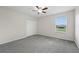 Bedroom featuring neutral walls and carpet with a double closet at 5233 Los Palma Vista Dr, Orlando, FL 32837