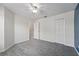 Bedroom with neutral walls, carpet, and large windows at 5233 Los Palma Vista Dr, Orlando, FL 32837