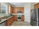 Well-lit kitchen featuring modern appliances, granite countertops and plenty of space at 5233 Los Palma Vista Dr, Orlando, FL 32837