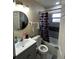 Cozy bathroom with updated fixtures, and a shower tub combo at 701 N 7Th St, Haines City, FL 33844