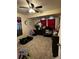 Bedroom featuring soft carpet, ceiling fan, and plenty of space at 701 N 7Th St, Haines City, FL 33844