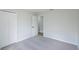 Bright bedroom boasts a standard closet, carpet flooring and neutral walls that offer customization at 316 Red Kite Dr, Groveland, FL 34736