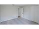 This cozy bedroom provides a blank canvas with carpet flooring and a standard closet for easy customization at 316 Red Kite Dr, Groveland, FL 34736