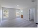 Spacious main bedroom features neutral walls, carpeted floors and two large windows for natural light at 316 Red Kite Dr, Groveland, FL 34736