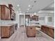 Stunning kitchen boasts stainless steel appliances, granite countertops, and ample cabinet space at 3544 Lakeside Heritage Dr, Lakeland, FL 33812