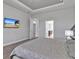 Serene main bedroom boasts soft carpeting and ensuite bathroom at 3544 Lakeside Heritage Dr, Lakeland, FL 33812