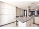 Well-designed kitchen with a center island, ample storage, and modern finishes at 4132 Festival Pointe Blvd, Mulberry, FL 33860