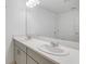 Bright bathroom featuring a double sink vanity with modern fixtures and ample counter space at 4732 Babys Breath Pl, Kissimmee, FL 34758