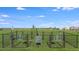 Community dog park with separate areas for small and large breeds featuring well-maintained green spaces at 4732 Babys Breath Pl, Kissimmee, FL 34758