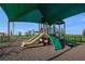 Community playground featuring a variety of slides and climbing structures, providing a fun outdoor experience at 4732 Babys Breath Pl, Kissimmee, FL 34758
