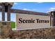 Attractive stone sign for Scenic Terrace at 4732 Babys Breath Pl, Kissimmee, FL 34758