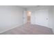 Neutral bedroom with closet and carpet flooring at 16398 Yelloweyed Dr, Clermont, FL 34714