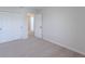 Neutral bedroom with closet and carpet flooring at 16398 Yelloweyed Dr, Clermont, FL 34714