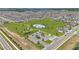 Aerial view of a Gathering-friendly community with a playground, pool, and parking at 2359 White Cedar Way, Haines City, FL 33844
