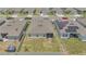 Aerial view of a home with a fenced backyard and screened-in porch at 2359 White Cedar Way, Haines City, FL 33844