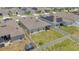 Aerial view showcasing a fenced backyard with a screened-in porch at 2359 White Cedar Way, Haines City, FL 33844