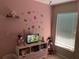 Whimsical ' bedroom featuring bright colors, playful decor, and a fun, inviting atmosphere at 110 N Chester St, Leesburg, FL 34748