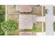 Aerial view of home's roof showing overall layout, backyard, driveway and neighboring houses at 16828 N Gold Star Ct, Clermont, FL 34714
