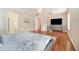 This is the main bedroom, including view into the bathroom and walk-in closet at 16828 N Gold Star Ct, Clermont, FL 34714