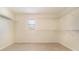 Spacious walk-in closet with shelving and a window at 16828 N Gold Star Ct, Clermont, FL 34714