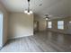 Open-concept dining area with new flooring, a modern light fixture, and easy access to the living areas at 16910 Sw 27 Avenue, Ocala, FL 34473