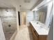 Bathroom featuring double sinks, a vanity, and shower/tub combo at 4662 Tiffany Woods Cir, Oviedo, FL 32765