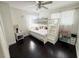 Bright bedroom with bunkbeds, hardwood floor, a ceiling fan, and toys at 4662 Tiffany Woods Cir, Oviedo, FL 32765