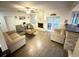 Comfortable living room featuring a fireplace, ceiling fan, and wood-look tile flooring at 4662 Tiffany Woods Cir, Oviedo, FL 32765