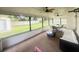Covered patio area with furniture and views of the backyard at 4662 Tiffany Woods Cir, Oviedo, FL 32765