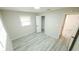 Bright bedroom with new floors, fresh paint, and plenty of natural light at 5834 Forest Grove Blvd, Orlando, FL 32808