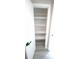 Organized closet with multiple shelves, new paint, and new floors at 5834 Forest Grove Blvd, Orlando, FL 32808