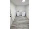 Functional laundry room equipped with modern washing machine and dryer, as well as durable and stylish flooring at 5834 Forest Grove Blvd, Orlando, FL 32808