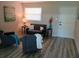 Living room with neutral walls, a window with blinds, and two sofas with side tables at 5834 Forest Grove Blvd, Orlando, FL 32808