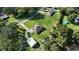 Overhead shot of a beautiful home with a large lot and mature trees in a serene setting at 33632 Wesley Rd, Eustis, FL 32736