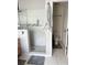 Bright bathroom with a modern glass enclosed shower and a separate toilet room at 33632 Wesley Rd, Eustis, FL 32736