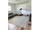 Workout room featuring modern exercise equipment and hardwood flooring at 33632 Wesley Rd, Eustis, FL 32736