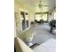 Spacious covered patio, great for entertaining, with multiple seating areas at 33632 Wesley Rd, Eustis, FL 32736