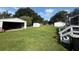 Large backyard with storage buildings at 4861 Myrtle View N Dr, Mulberry, FL 33860