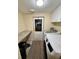 Laundry room with modern washer and dryer, plus countertop space at 4861 Myrtle View N Dr, Mulberry, FL 33860