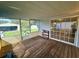 Enclosed screened porch with backyard view at 4861 Myrtle View N Dr, Mulberry, FL 33860