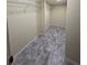 Empty walk-in closet with wire shelving and stylish flooring at 4861 Myrtle View N Dr, Mulberry, FL 33860