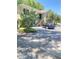 Inviting two-story condo building with black shutters, mature landscaping, and convenient parking spaces at 223 Windsor St # 6, Lakeland, FL 33803