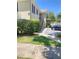 Charming condo building exterior with lush green lawn and a glimpse of available parking at 223 Windsor St # 6, Lakeland, FL 33803