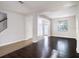 Spacious living room boasting hardwood floors and an abundance of natural light at 10084 Moss Rose Way, Orlando, FL 32832